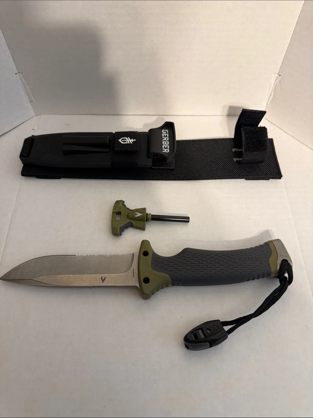 Gerber ultimate survival fixed blade knife w/ sheath, knife sharpener, ferro rod